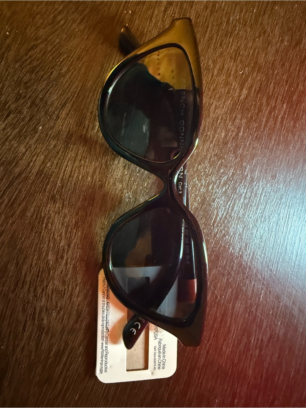 French Connection Black Cat-Eye Sunglasses with Dark Lenses